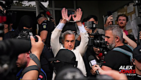 Georgescu in cuffs